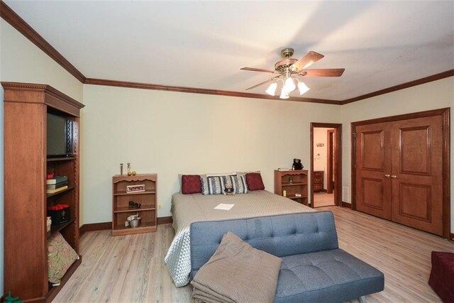 full bathroom with tile patterned floors, crown molding, combined bath / shower with glass door, toilet, and vanity