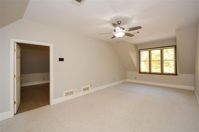 interior space with ceiling fan