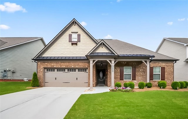 4547 Big Rock Ridge Trl SW, Gainesville, GA 30504 - craftsman house with brick siding, a front lawn, and concrete driveway