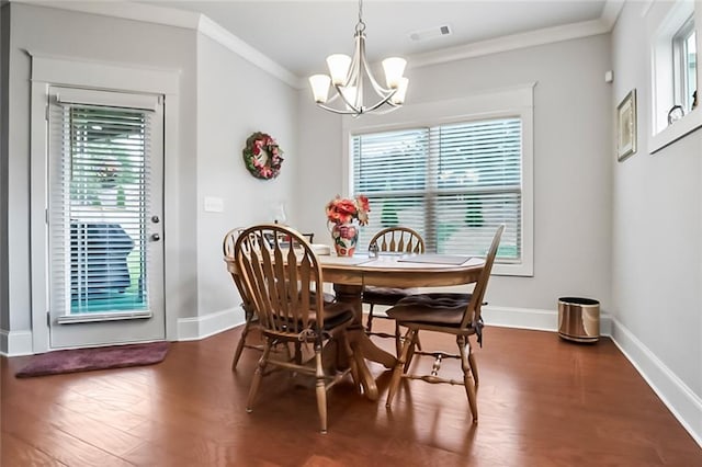 4547 Big Rock Ridge Trl SW, Gainesville, GA 30504 - dining space with a chandelier, crown molding, healthy amount of natural light, and wood finished floors