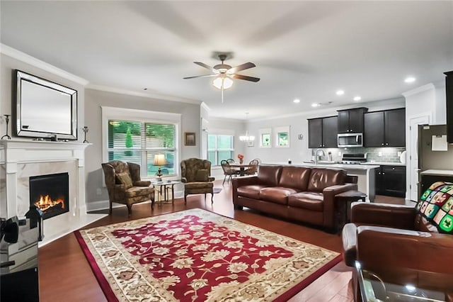 4547 Big Rock Ridge Trl SW, Gainesville, GA 30504 - living room with ornamental molding, ceiling fan, wood finished floors, a premium fireplace, and recessed lighting