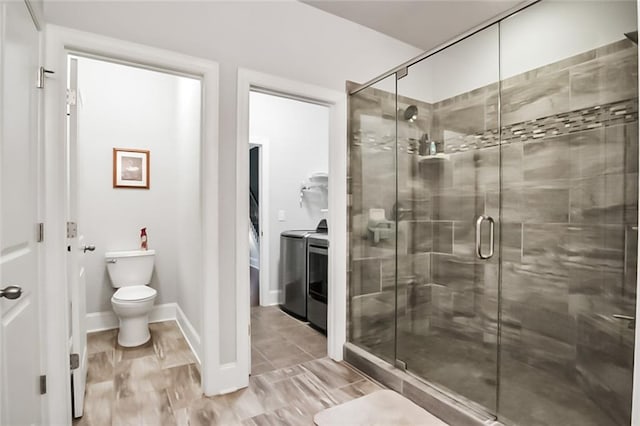 4547 Big Rock Ridge Trl SW, Gainesville, GA 30504 - bathroom with separate washer and dryer and a shower stall
