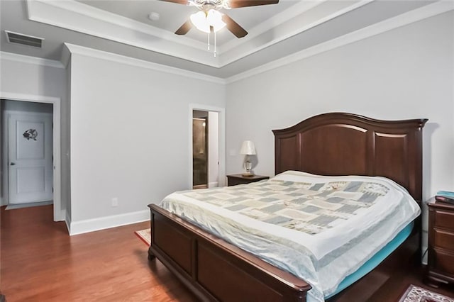 4547 Big Rock Ridge Trl SW, Gainesville, GA 30504 - bedroom with a tray ceiling, wood finished floors, crown molding, and a ceiling fan