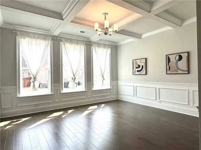 unfurnished room with beamed ceiling, a notable chandelier, and dark wood-style floors