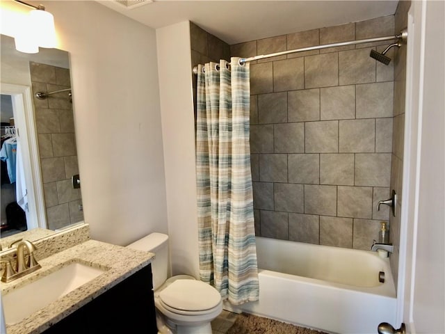 full bathroom with visible vents, toilet, vanity, and shower / bath combination with curtain