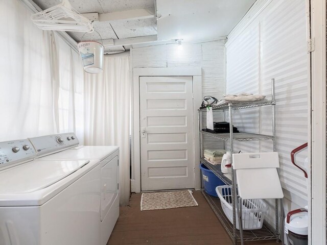 laundry area featuring dark hardwood / wood-style flooring and independent washer and dryer