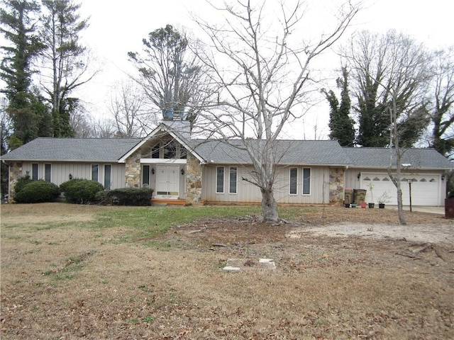 single story home with a garage