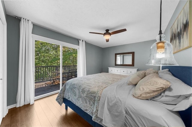 9430 Chestatee Ct, Gainesville, GA 30506 - bedroom with access to outside, wood finished floors, a textured ceiling, and ceiling fan