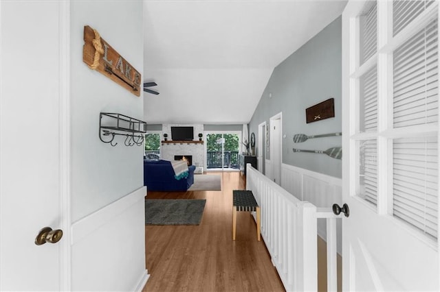 9430 Chestatee Ct, Gainesville, GA 30506 - hallway with wood finished floors, wainscoting, and vaulted ceiling