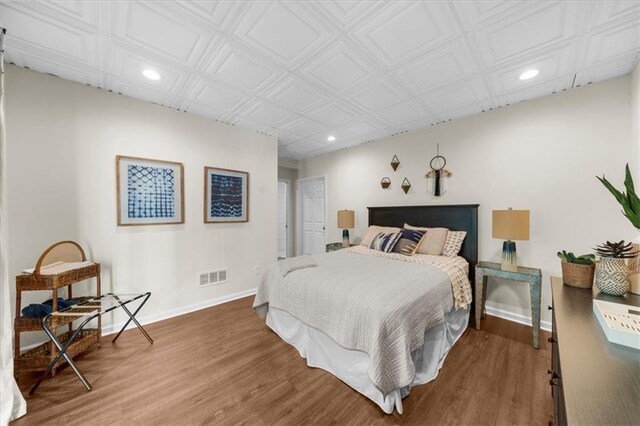9430 Chestatee Ct, Gainesville, GA 30506 - bedroom featuring recessed lighting, wood finished floors, and an ornate ceiling