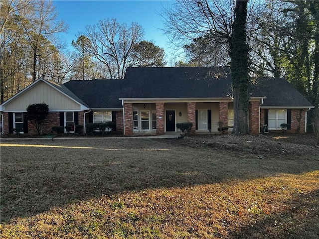 ranch-style house with a front yard