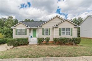 view of front of home with a front yard