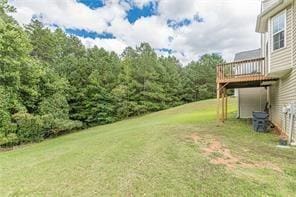 view of yard featuring a deck