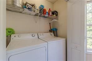 laundry area with washer and clothes dryer