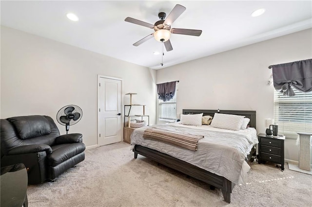 carpeted bedroom with baseboards, a ceiling fan, and recessed lighting