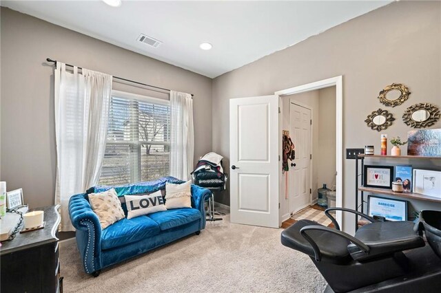 bedroom with recessed lighting, baseboards, visible vents, and light colored carpet