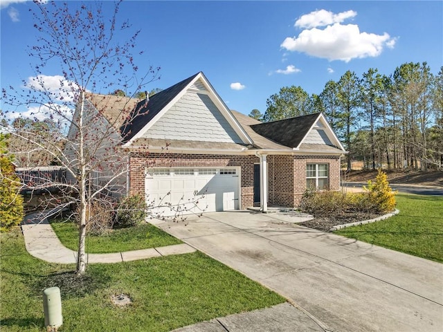 view of front of home featuring a front lawn, brick siding, driveway, and an attached garage