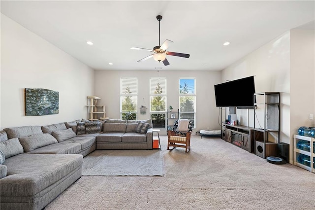 carpeted living area featuring ceiling fan and recessed lighting