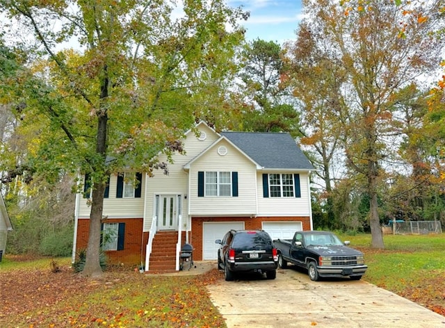 split foyer home featuring a garage