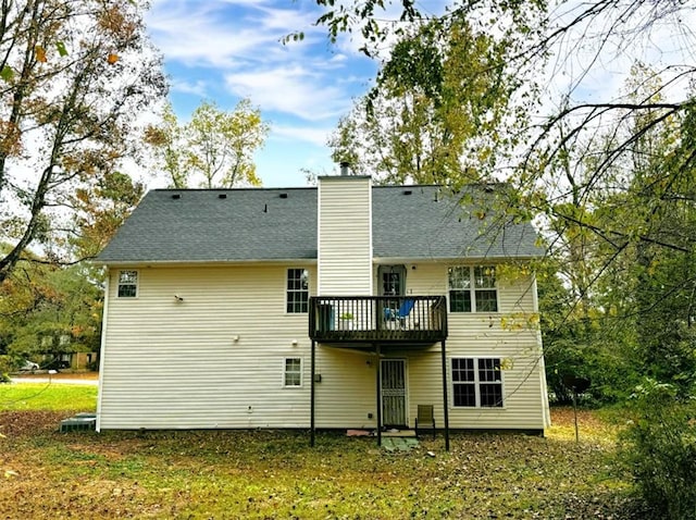 rear view of house with a deck