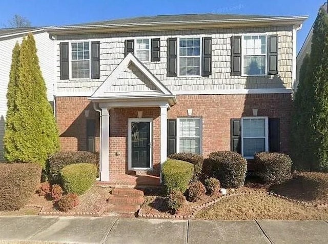 view of front of property with brick siding