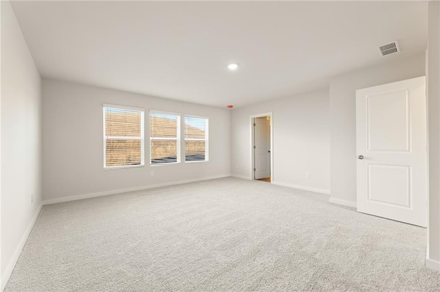 4032 Trimrose Ct, Atlanta, GA 30349 - carpeted spare room with baseboards and recessed lighting