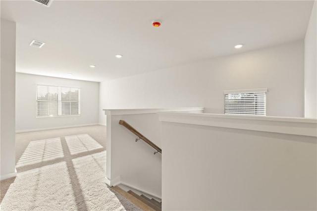4032 Trimrose Ct, Atlanta, GA 30349 - hallway with an upstairs landing, recessed lighting, and baseboards