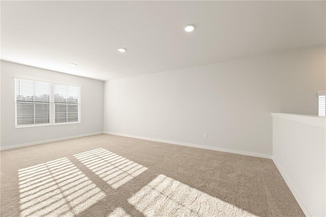 4032 Trimrose Ct, Atlanta, GA 30349 - unfurnished room featuring light carpet, baseboards, and recessed lighting