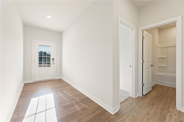 4032 Trimrose Ct, Atlanta, GA 30349 - corridor featuring light wood-type flooring and baseboards