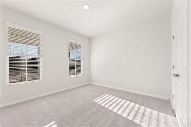 4032 Trimrose Ct, Atlanta, GA 30349 - carpeted empty room featuring baseboards, healthy amount of natural light, and recessed lighting
