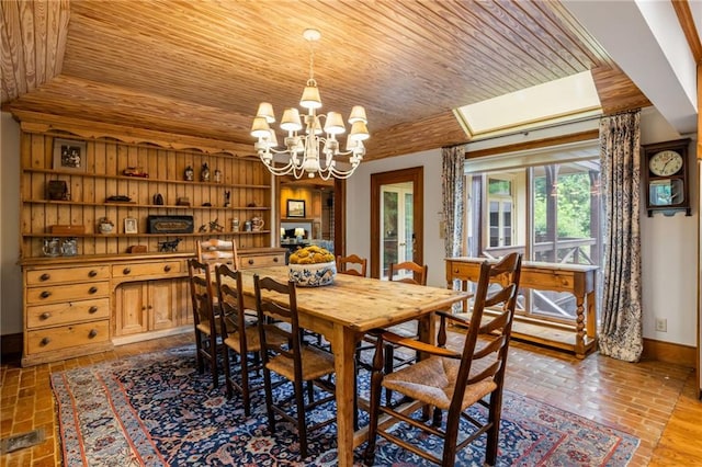44 Muscogee Ave NW, Atlanta, GA 30305 - dining area featuring wooden ceiling, baseboards, a chandelier, and brick floors
