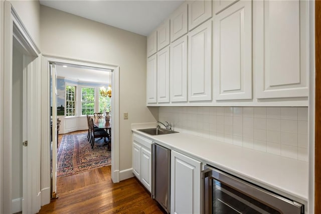 44 Muscogee Ave NW, Atlanta, GA 30305 - indoor bar featuring beverage cooler, dark wood-type flooring, tasteful backsplash, and fridge