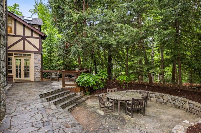 44 Muscogee Ave NW, Atlanta, GA 30305 - view of patio featuring outdoor dining area and french doors