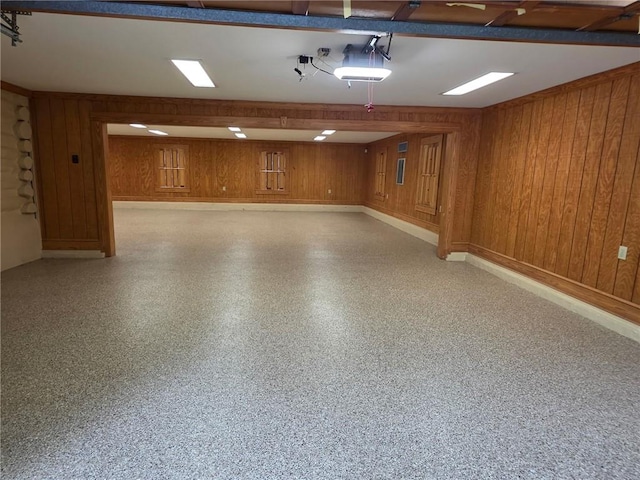 44 Muscogee Ave NW, Atlanta, GA 30305 - garage featuring wood walls and a garage door opener