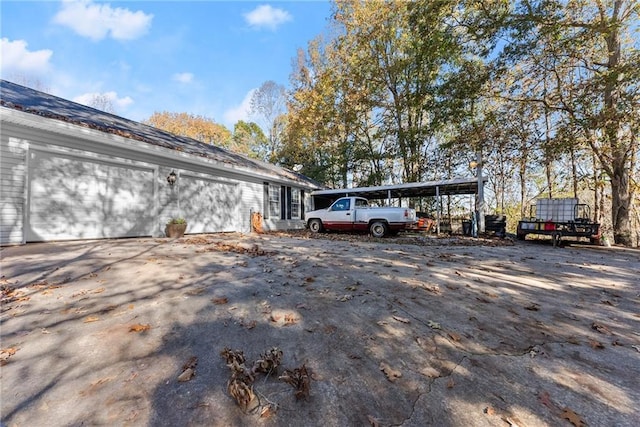 view of car parking featuring driveway