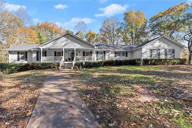 ranch-style house featuring covered porch