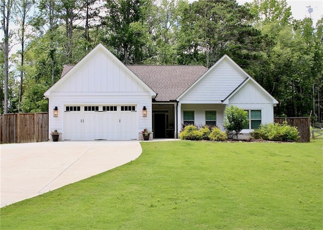 688 Harmony Rd, Temple, GA 30179 - view of front facade featuring board and batten siding, concrete driveway, a garage, and roof with shingles