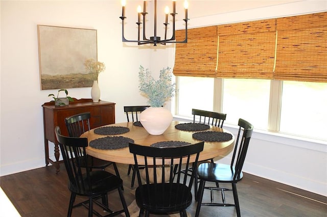 688 Harmony Rd, Temple, GA 30179 - dining room with a chandelier, plenty of natural light, and dark wood-type flooring