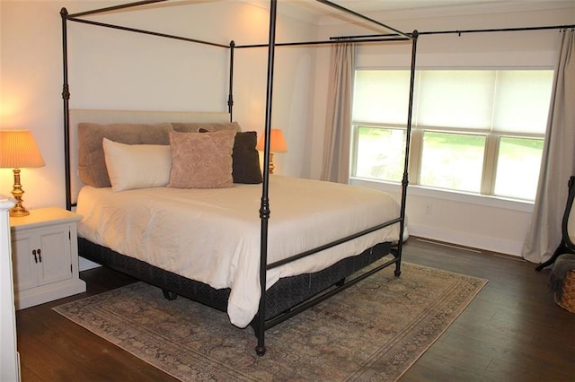 688 Harmony Rd, Temple, GA 30179 - bedroom with dark wood finished floors and baseboards