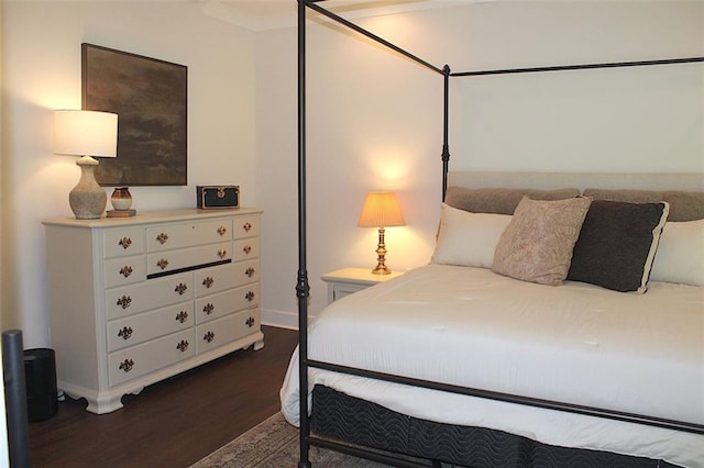 688 Harmony Rd, Temple, GA 30179 - bedroom featuring baseboards and dark wood-type flooring
