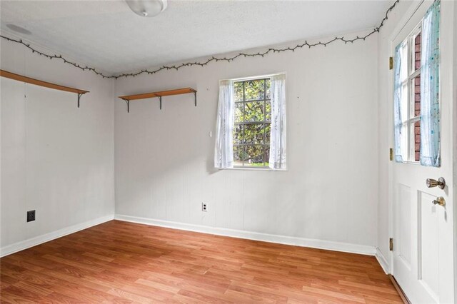 140 Carriage Cir, Stockbridge, GA 30281 - empty room featuring light wood finished floors and baseboards