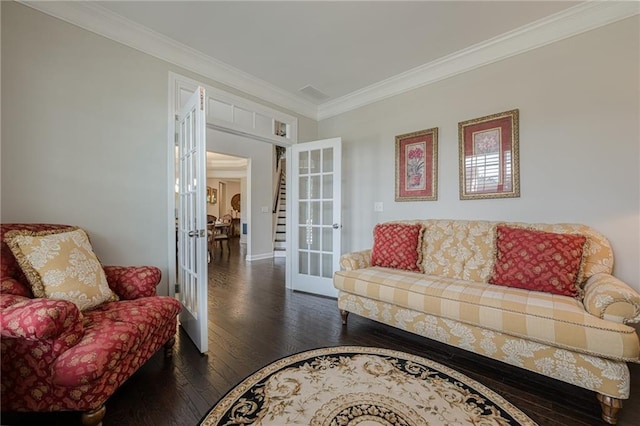 5515 Cheatam Ave, Cumming, GA 30040 - living room with french doors, wood finished floors, and crown molding