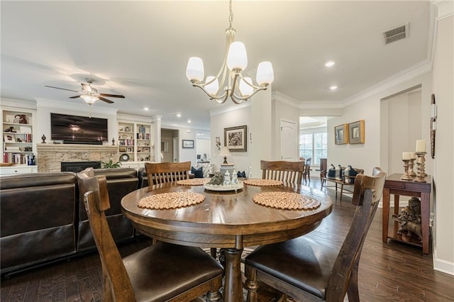 5515 Cheatam Ave, Cumming, GA 30040 - dining room with ceiling fan, dark wood-style floors, ornamental molding, a fireplace, and recessed lighting