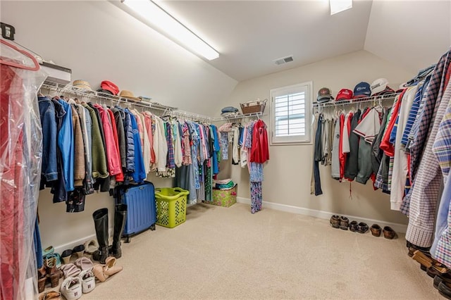 5515 Cheatam Ave, Cumming, GA 30040 - spacious closet featuring vaulted ceiling and carpet flooring