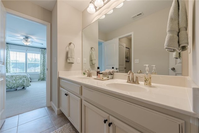 5515 Cheatam Ave, Cumming, GA 30040 - full bathroom with double vanity, ensuite bathroom, tile patterned flooring, and a ceiling fan