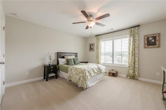 5515 Cheatam Ave, Cumming, GA 30040 - bedroom with light colored carpet and a ceiling fan