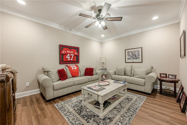 5515 Cheatam Ave, Cumming, GA 30040 - living room with wood finished floors, a ceiling fan, recessed lighting, and crown molding