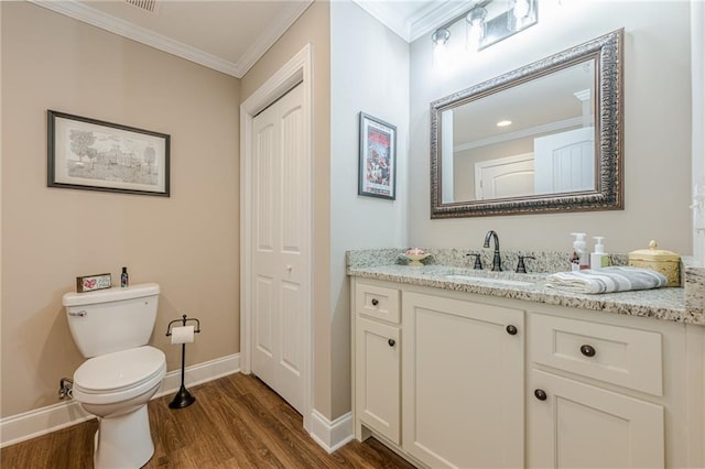 5515 Cheatam Ave, Cumming, GA 30040 - bathroom featuring ornamental molding, vanity, and wood finished floors
