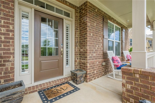 5515 Cheatam Ave, Cumming, GA 30040 - doorway to property featuring a porch and brick siding