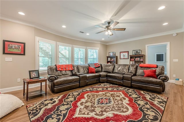 5515 Cheatam Ave, Cumming, GA 30040 - living area with ceiling fan, wood finished floors, ornamental molding, and recessed lighting
